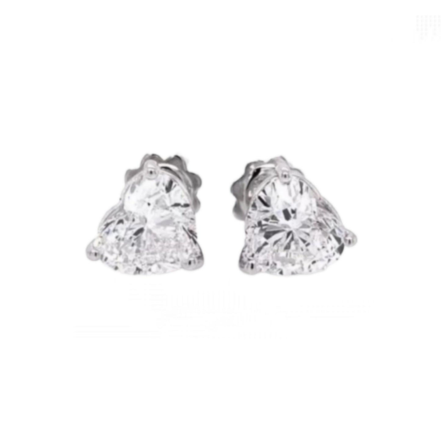 boucles d'oreilles point lumineux en or blanc 18 carats et 2 diamants naturels taille coeur 0,50 ct