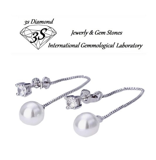 boucles d'oreilles point lumineux en or blanc 18 carats et 2 diamants naturels 0,20ct avec perles australiennes 9mm