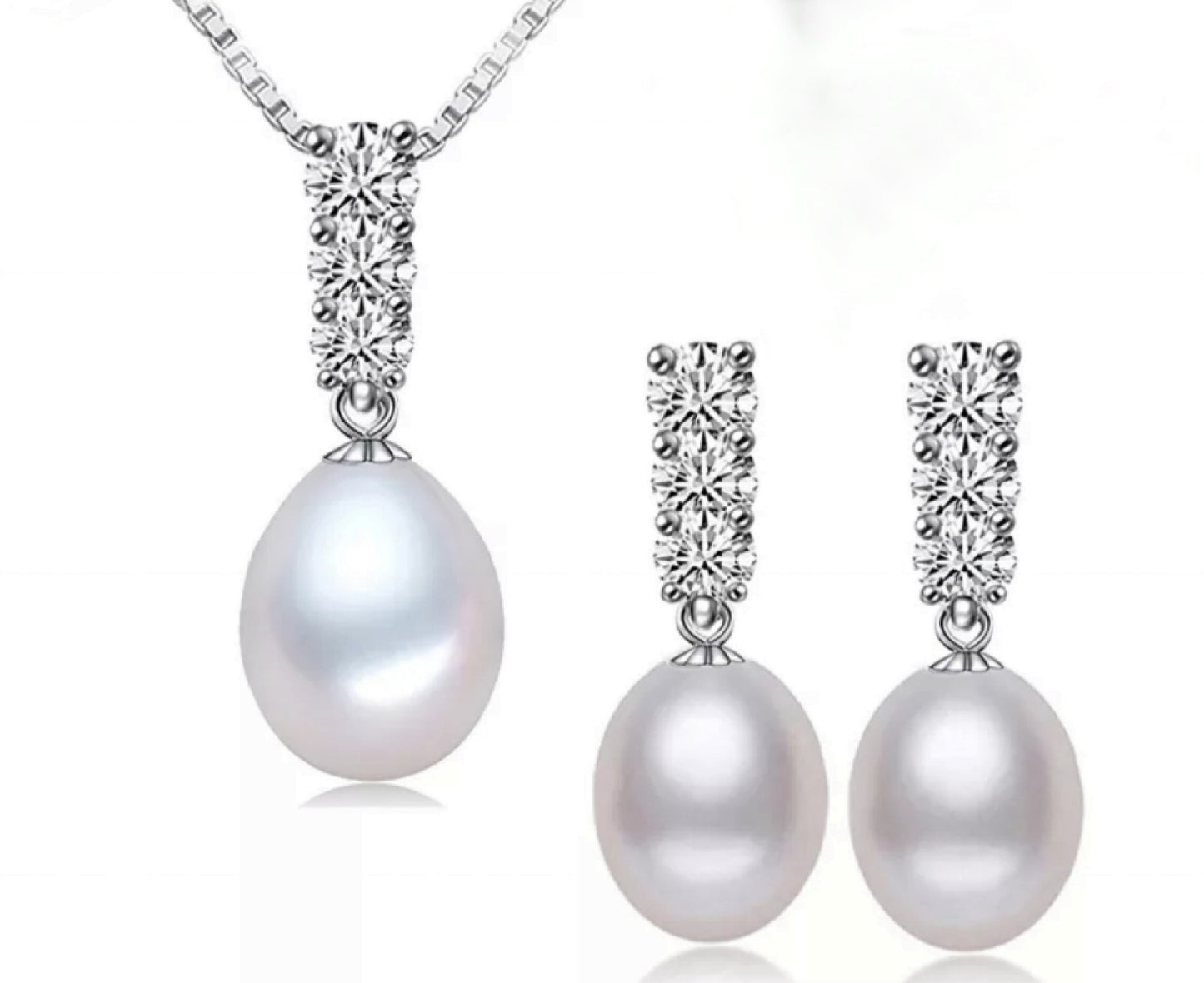 parure trilogie complète composée d'un collier et de boucles d'oreilles avec perle blanche naturelle, diamant naturel 0,90ct Couleur E VVS1